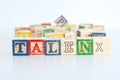 The word Ã¢â¬ÅtalentÃ¢â¬Â spelled with wooden letter cubes